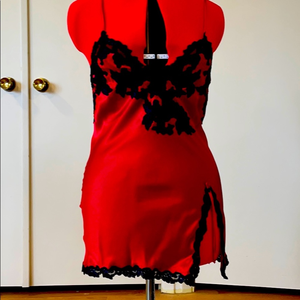 Red silk chemise with contrasting black lace.